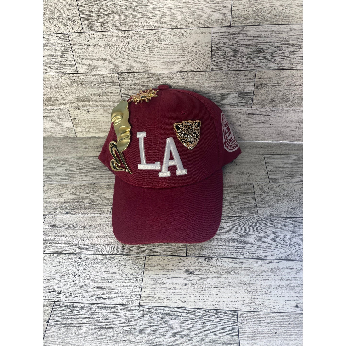 Gold pin LA hat
