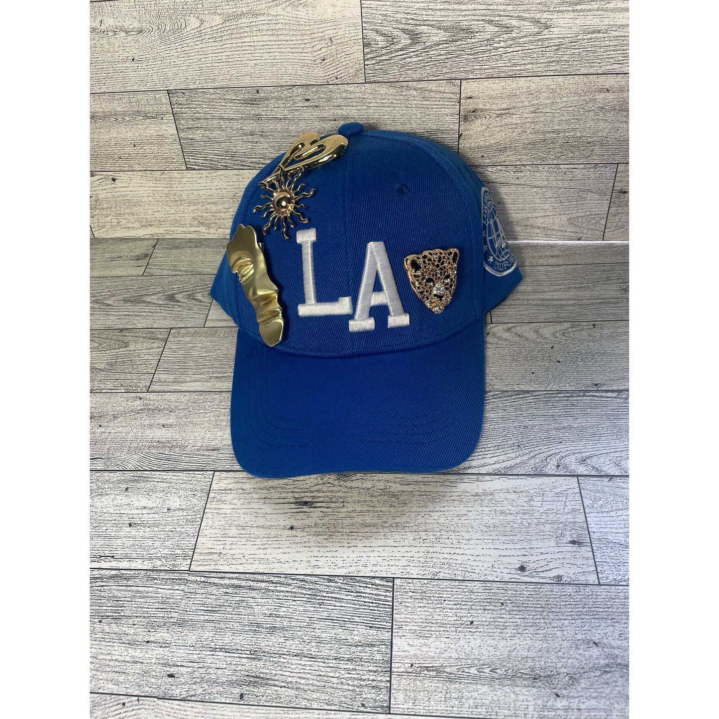 Gold pin LA hat