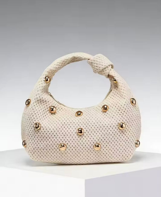 Knitted studded purse