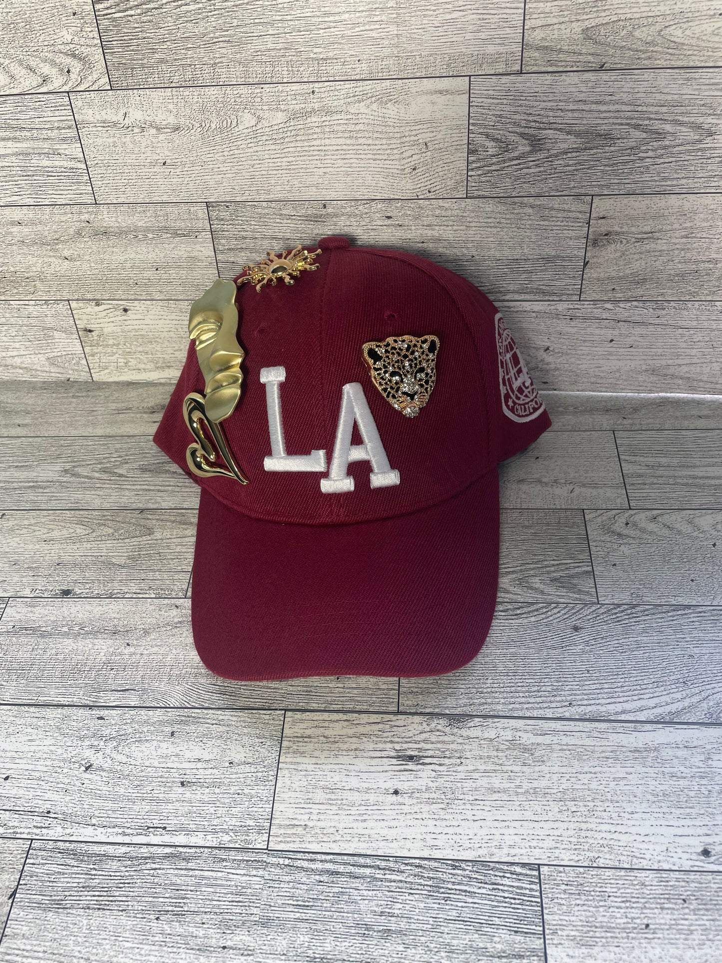 Gold pin LA hat