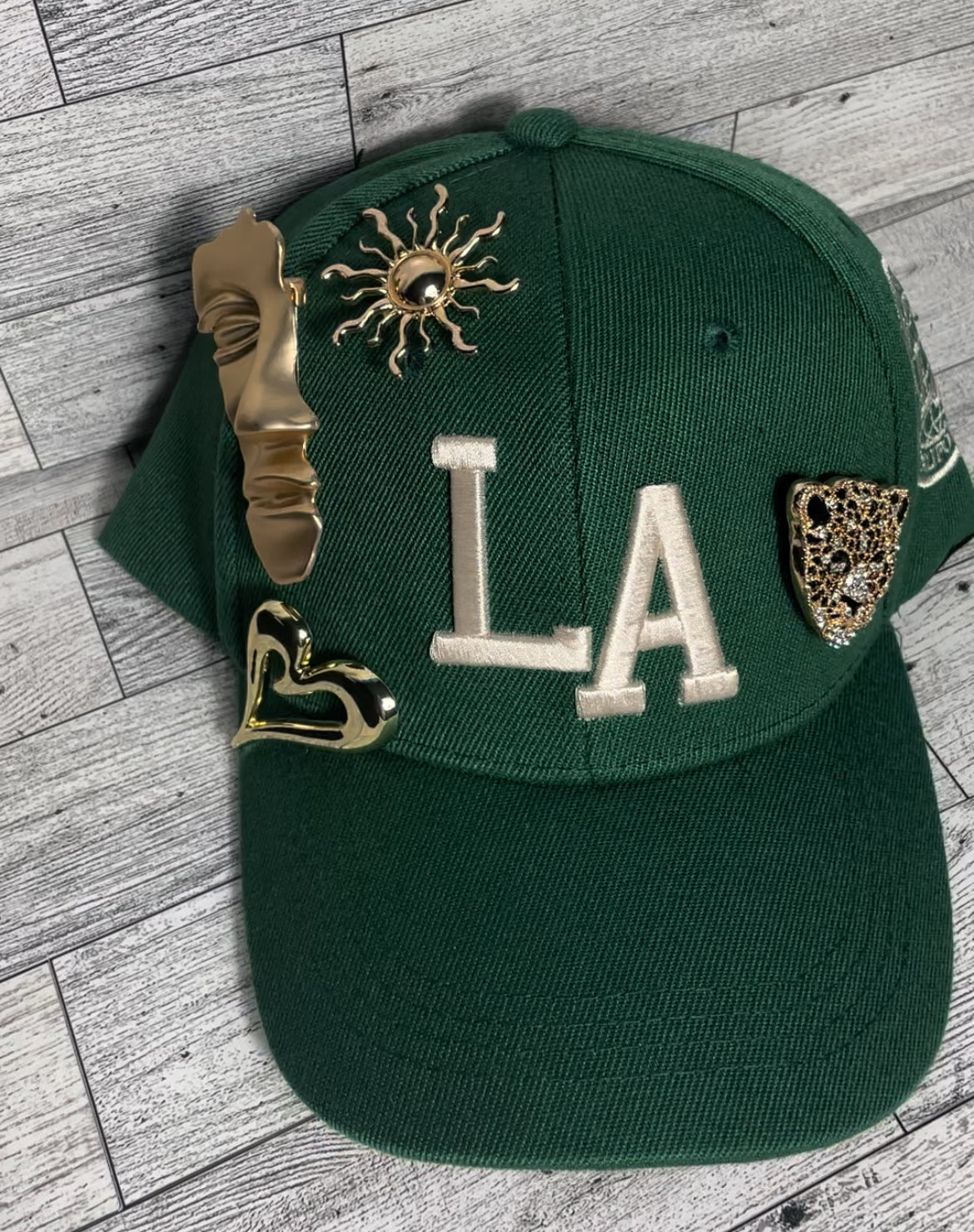 Gold pin LA hat