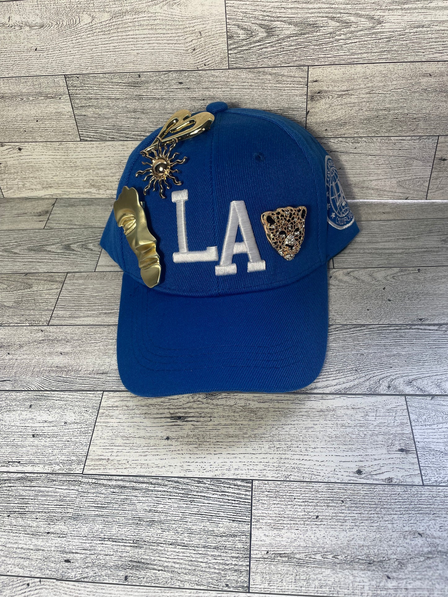 Gold pin LA hat